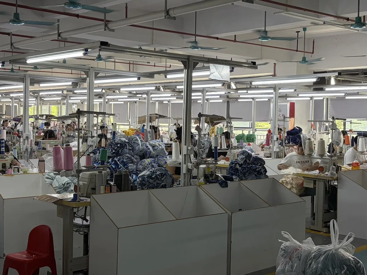 Fabric inspection station where rolls are checked for weight and defects