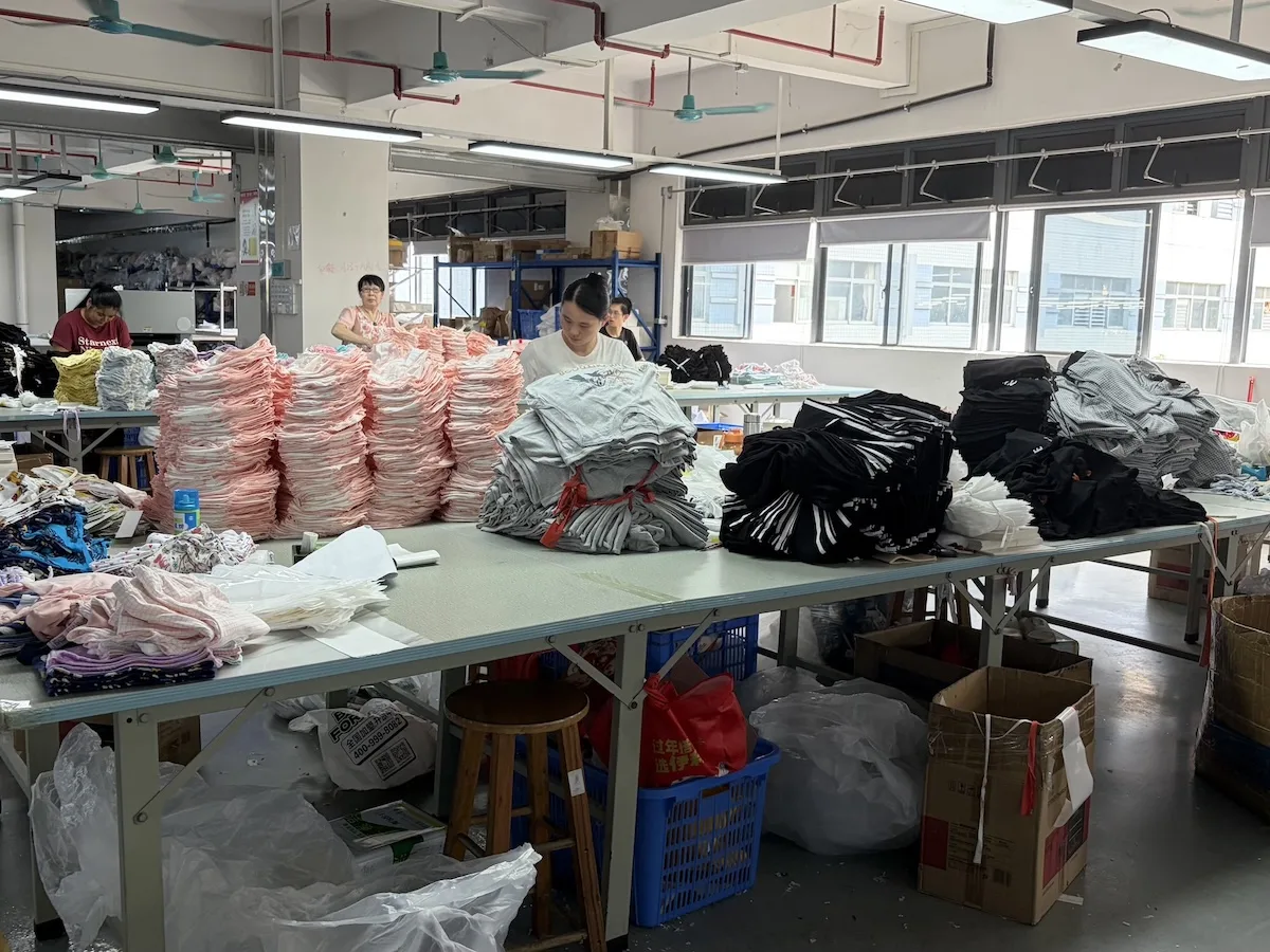 Fabric sorting area separating sleepwear base fabrics by spec