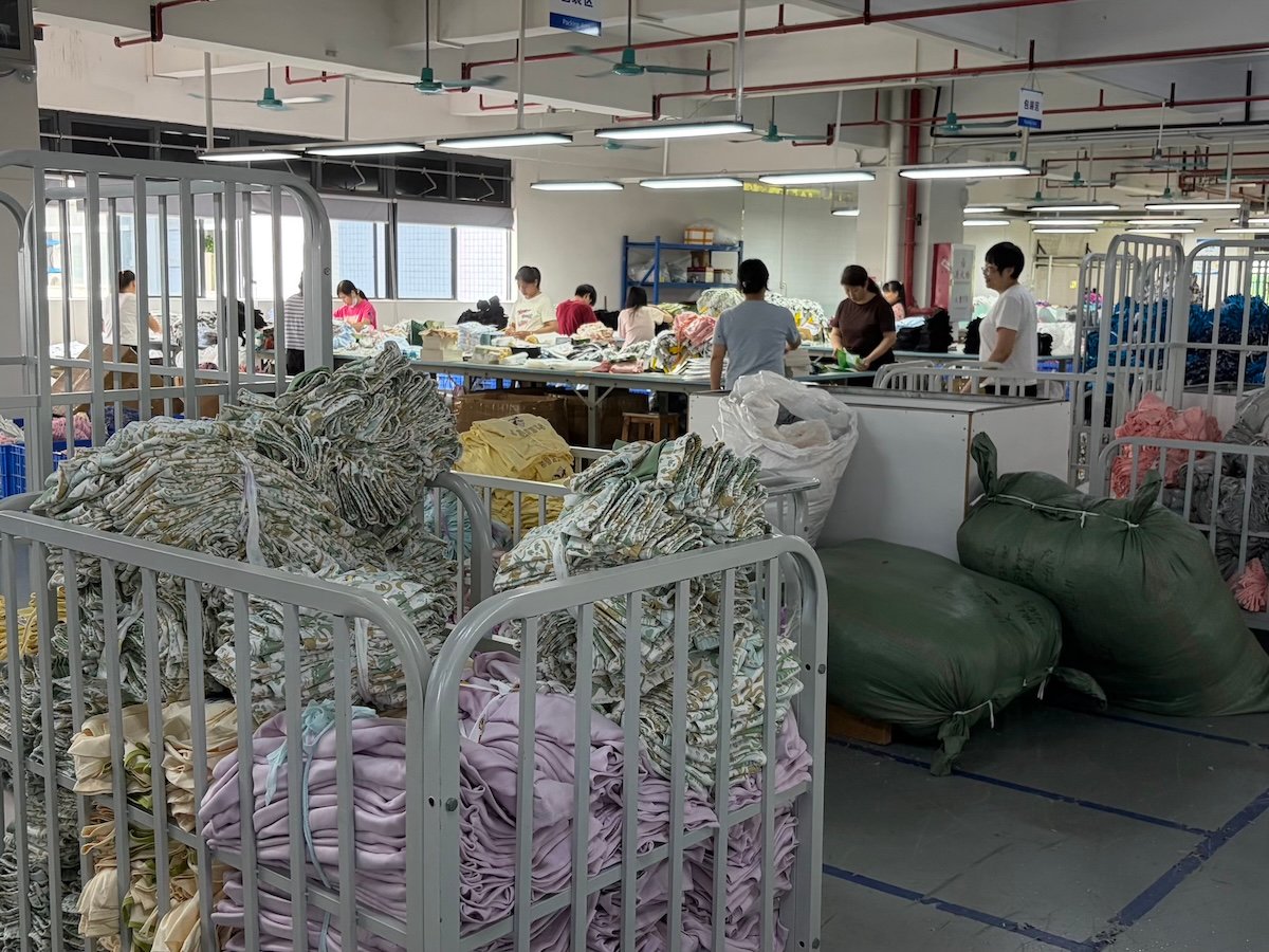 Fabric spreading on a cutting table ahead of bulk production