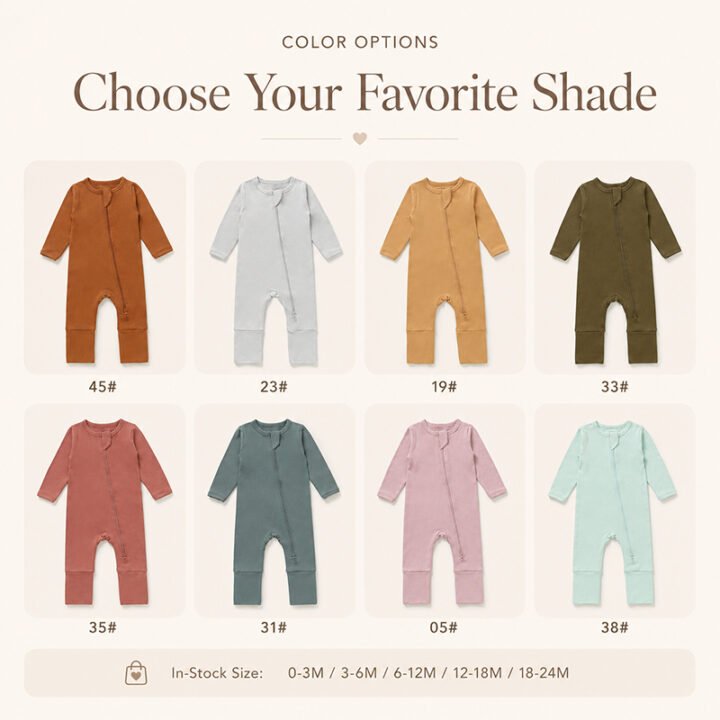 Eight solid color options for bamboo baby rompers in sizes from newborn to 24 months