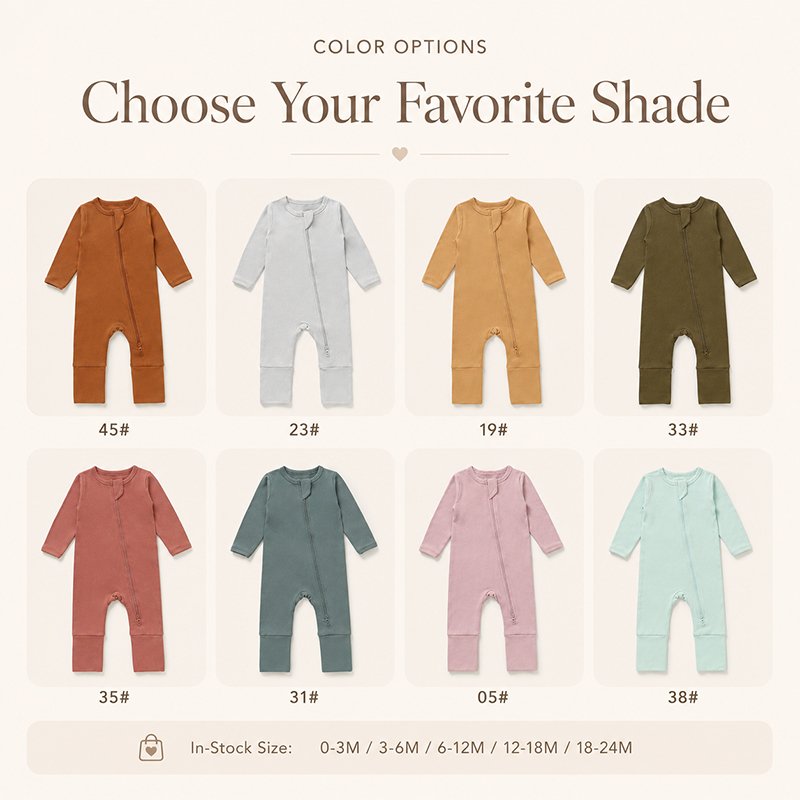 Eight solid color options for bamboo baby rompers in sizes from newborn to 24 months