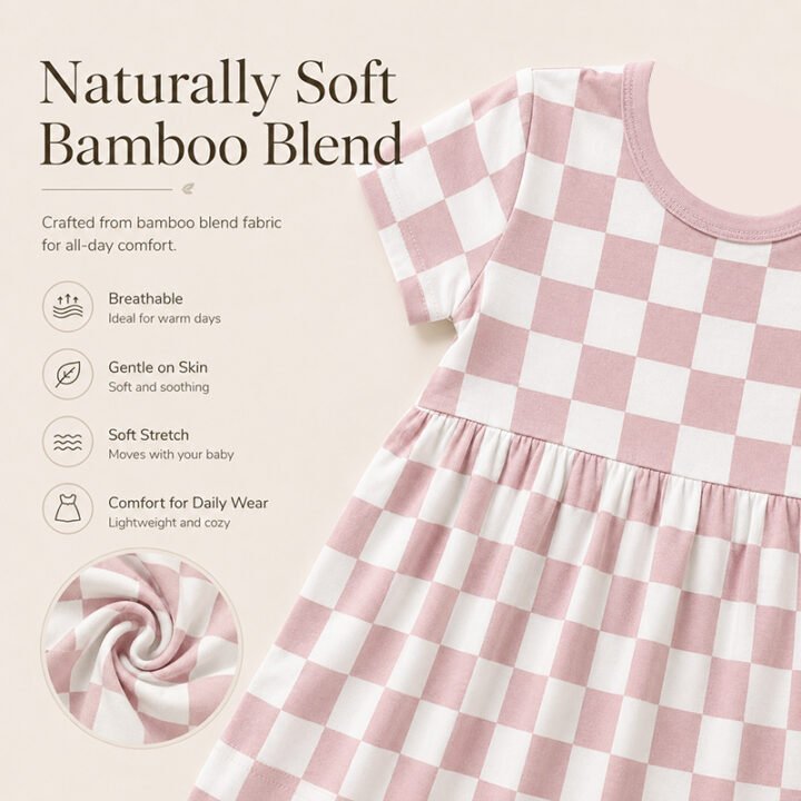 Pink checkered bamboo viscose girls dress showing soft stretch jersey fabric and gathered construction