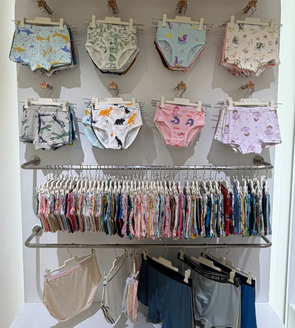 Kids underwear showroom displaying cotton briefs and boxer shorts for boys and girls