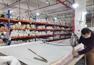Fabric cutting from an approved marker at Nuohua Garment