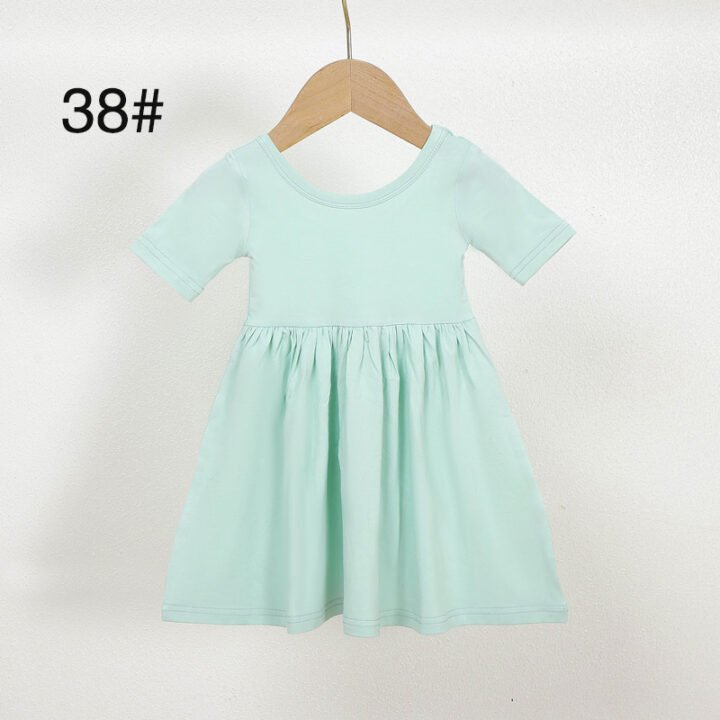 Mint green short sleeve bamboo viscose girls dress color 38 displayed on a wooden hanger