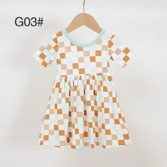 Mint orange and white checkered bamboo viscose girls dress G03 displayed on a wooden hanger