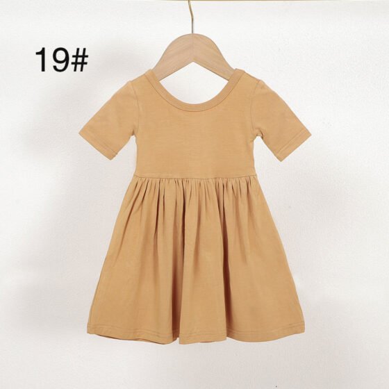 Mustard bamboo viscose girls dress color 19 with round neckline and gathered skirt