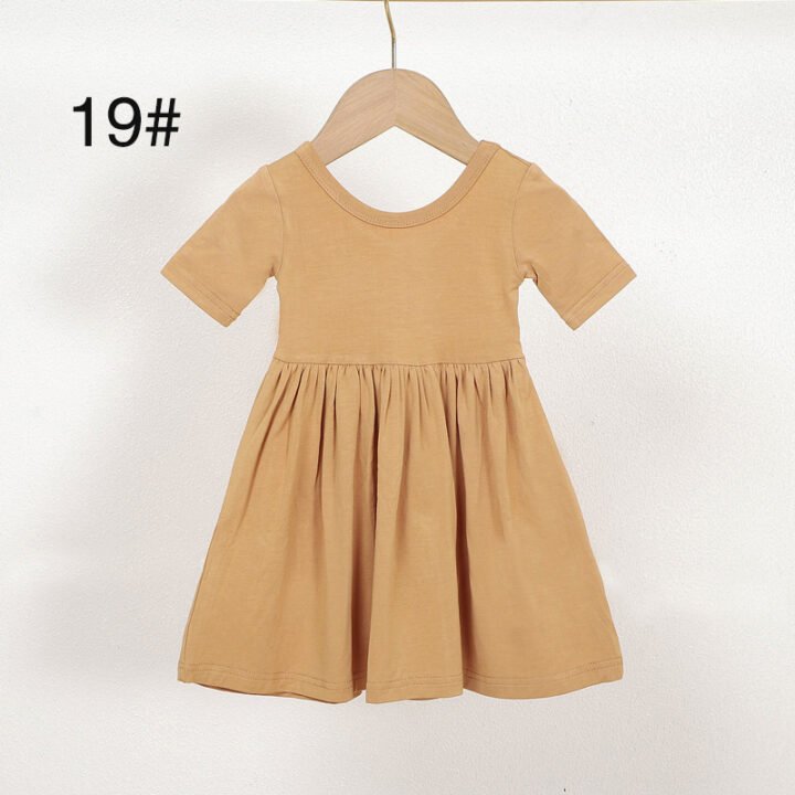 Mustard bamboo viscose girls dress color 19 with round neckline and gathered skirt