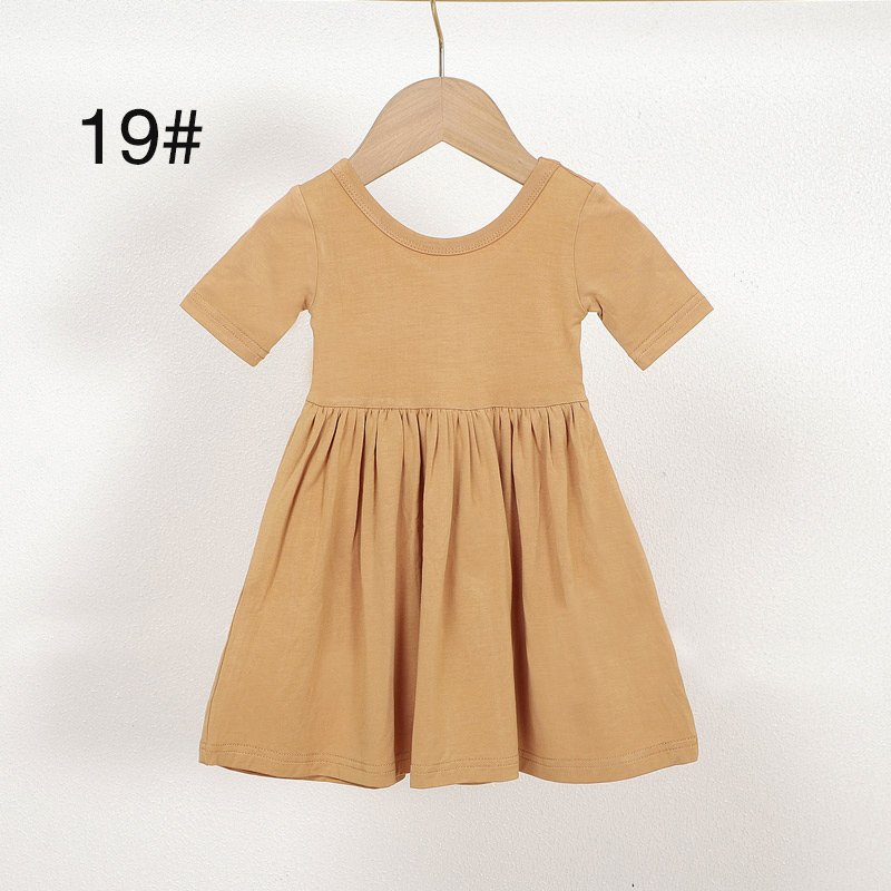 Mustard bamboo viscose girls dress color 19 with round neckline and gathered skirt