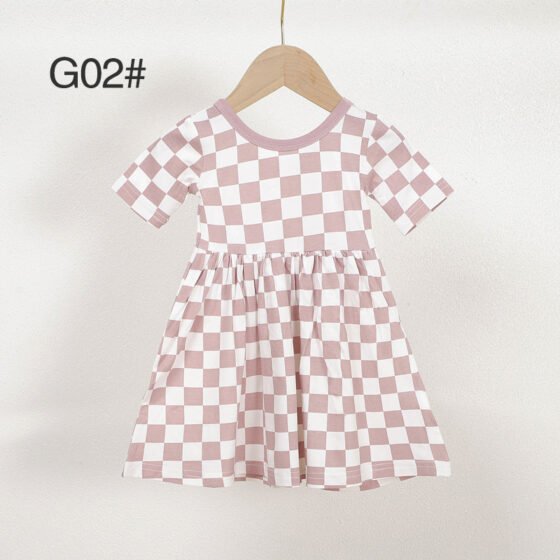 Pink and white checkered bamboo viscose girls dress G02 displayed on a wooden hanger