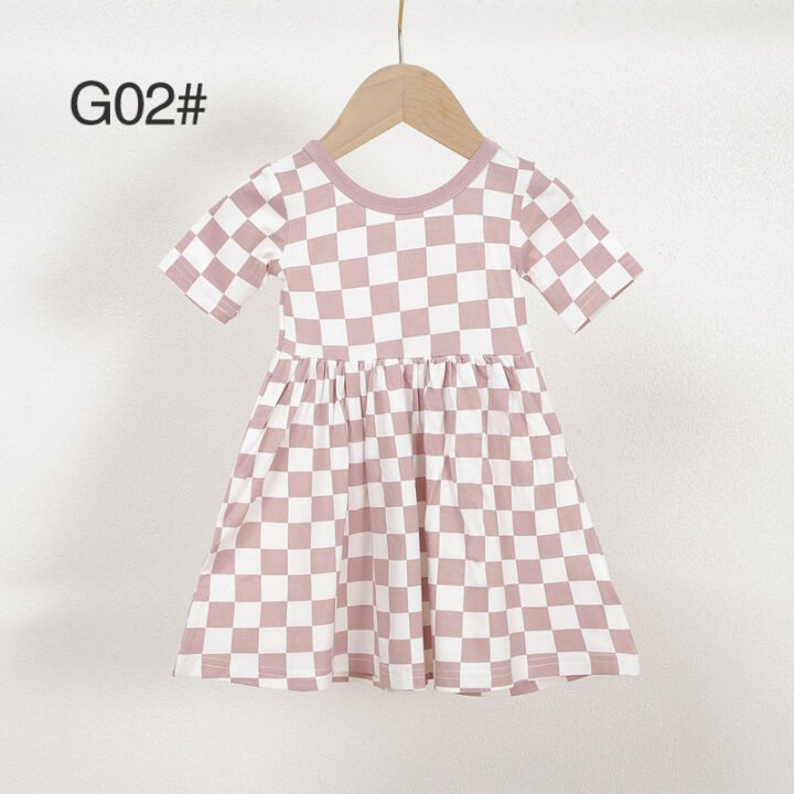 Pink and white checkered bamboo viscose girls dress G02 displayed on a wooden hanger